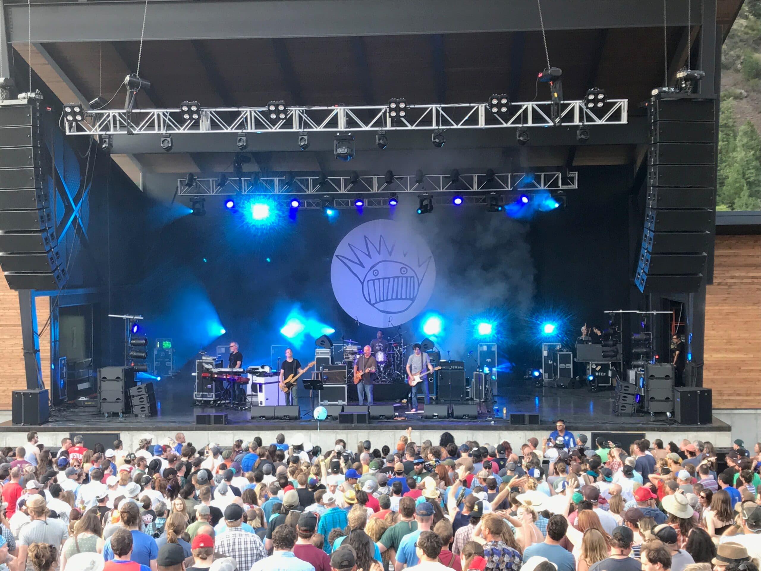 Festival main stage produced by Shaped Music, lit in purple and blue